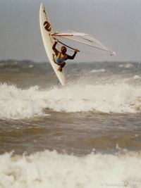 Windsurfer in de branding van Noordwijk